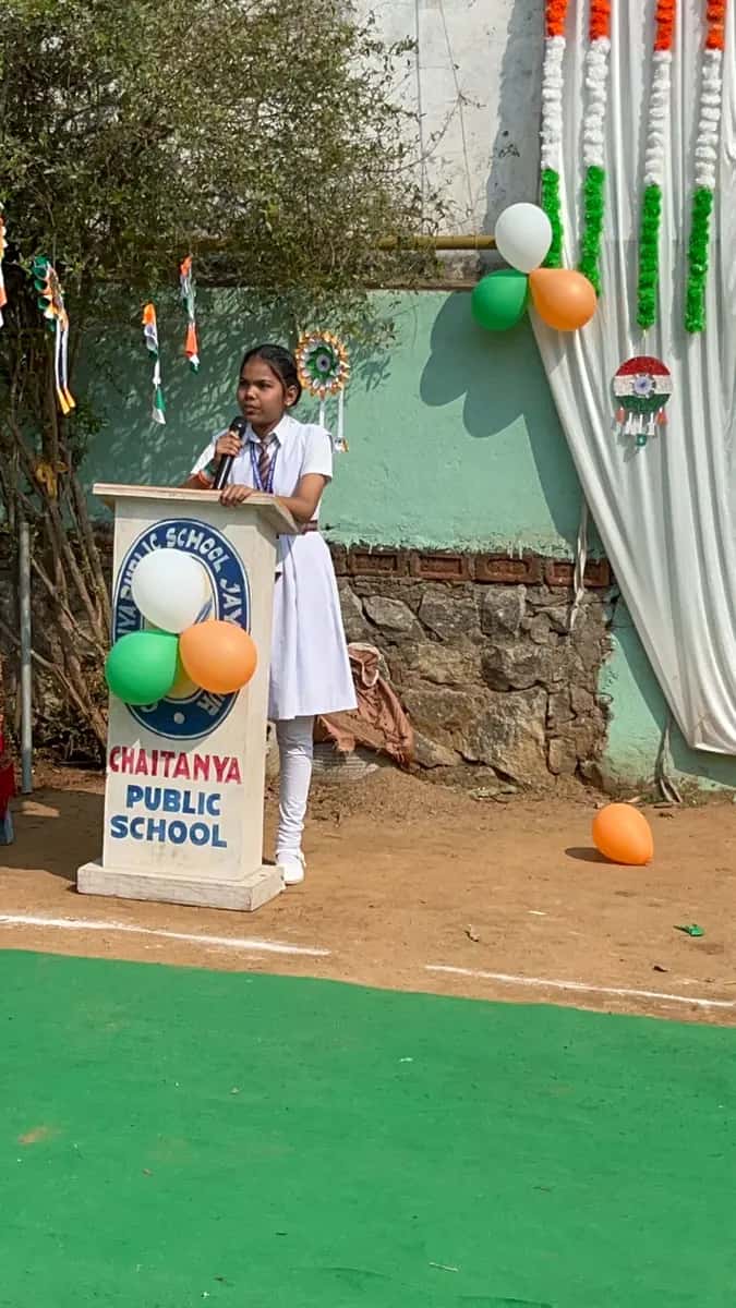 A student giving a speech at the podium